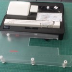 Embroidery arm and extension table